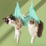 Comfortable cat grooming restraint bag with hammock hanging – ideal for nail cutting, trimming, and anti-scratch protection