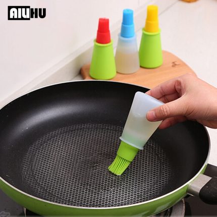 Effortlessly add flavor to your grilled dishes with the barbecue oil brush silicone bbq honey oil bottle with brush