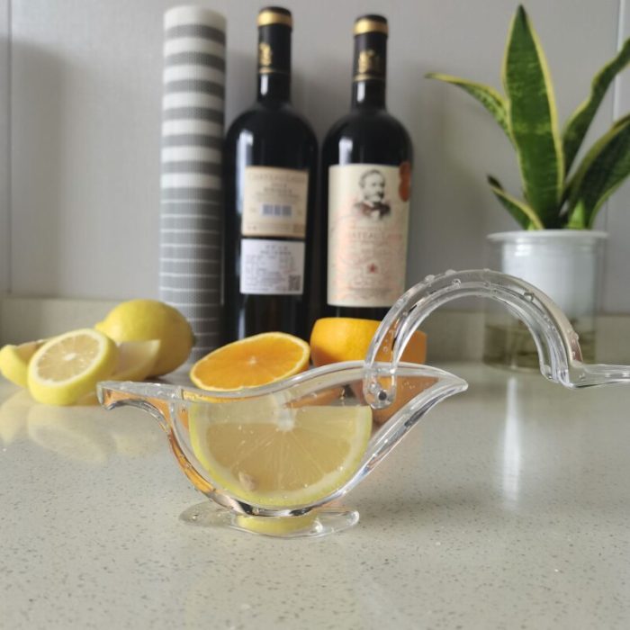 Manual citrus juicer – bird/fish shape transparent squeezer
