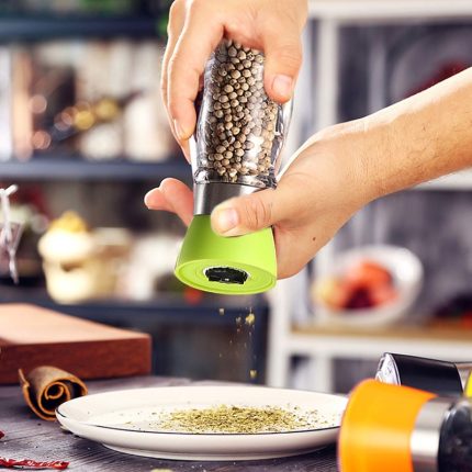 Add flavor to your dishes with our manual salt and pepper mill grinder – essential kitchen gadget for convenient seasoning