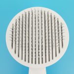 Self-cleaning slicker brush for dogs and cats – removes tangles, massages, and improves circulation
