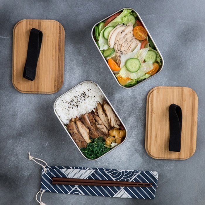 Stylish stainless steel bento box with wooden cover: perfect for lunches on the go